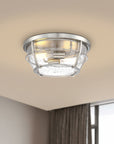 Brushed Nickel 2-light 13" Flush Mount ceiling light with seeded glass installed on the bedroom ceiling