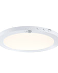 bottom view of the 12" matte white round ceiling flush mount light with light on