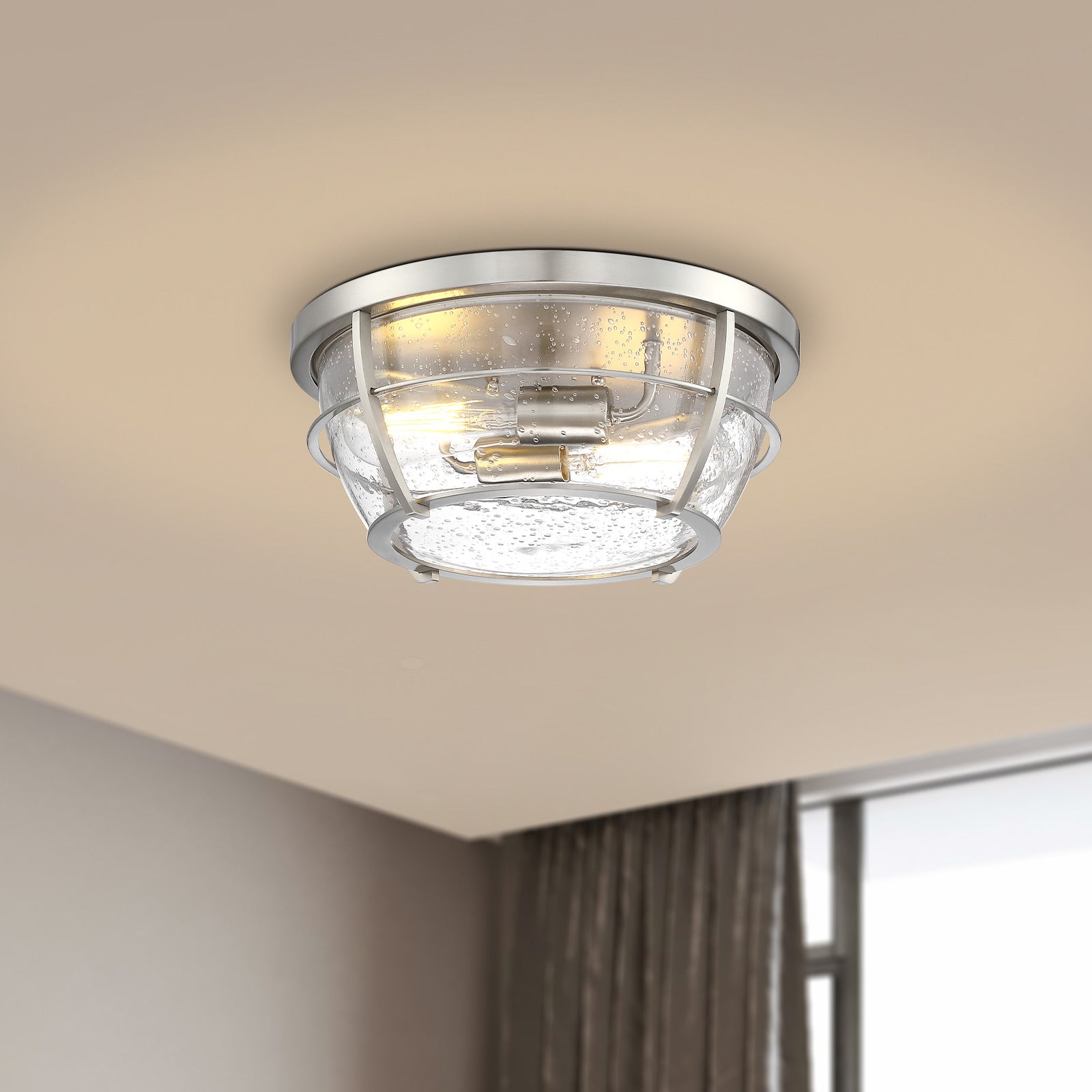 Brushed Nickel 2-light 13" Flush Mount ceiling light with seeded glass installed on the bedroom ceiling 